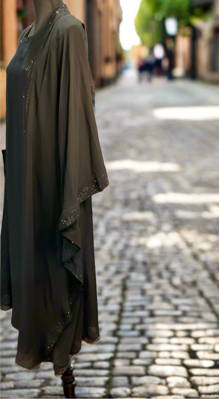 Unbothered Maliha Dress” (مليحة), meaning “Beautiful”